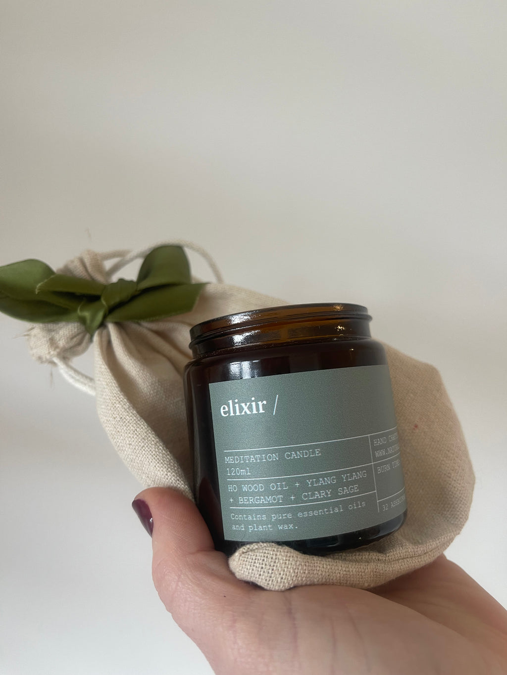 elixir small candle in a muslin bag