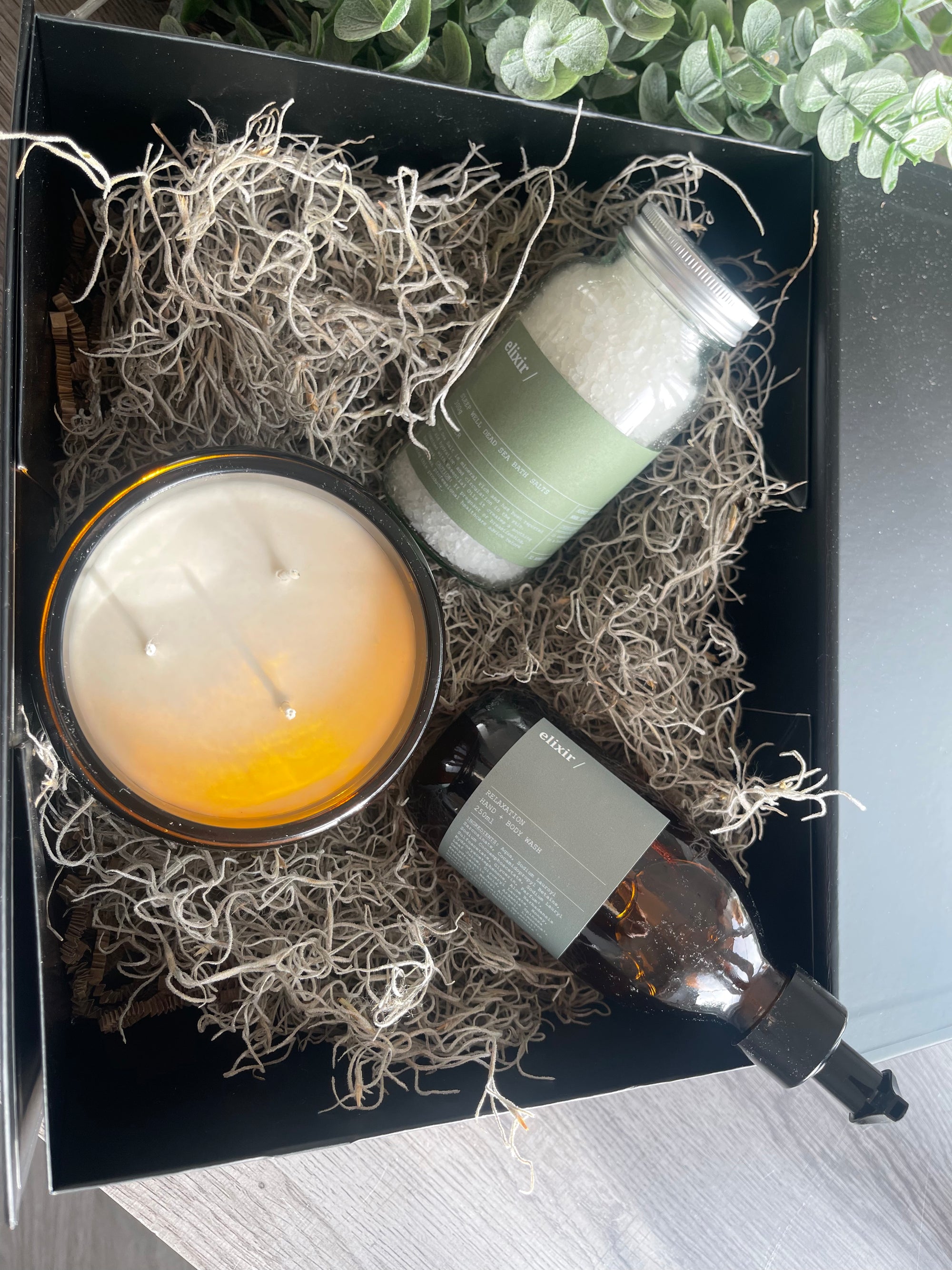 elixir black gift box with large 3 wick candle, hand wash and bath soak