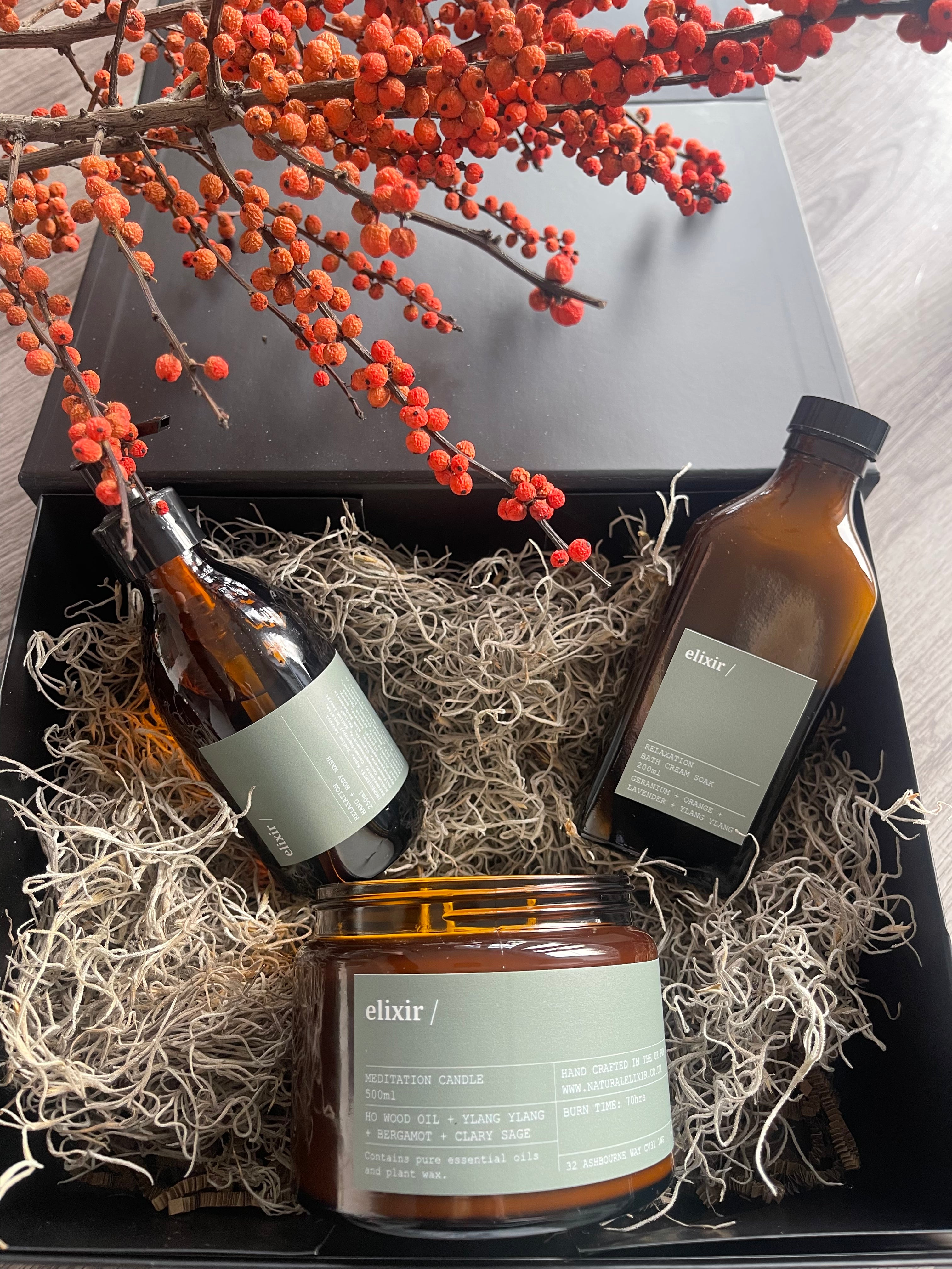 elixir black gift box with large 3 wick candle, hand wash and bath soak